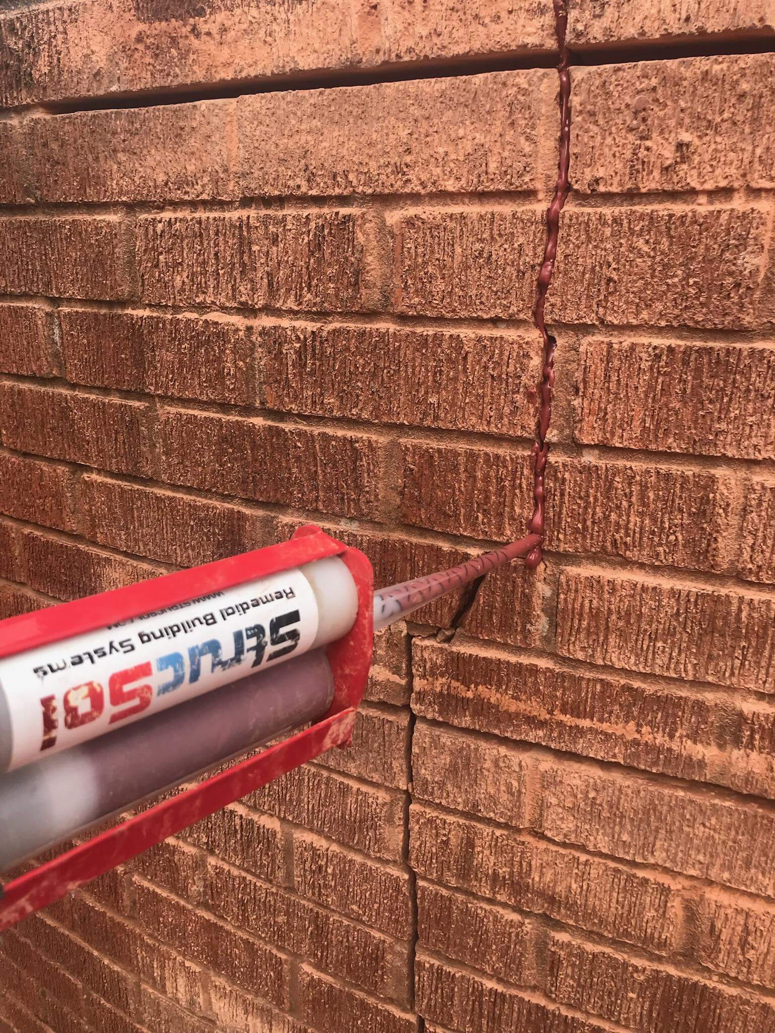 Strucsol pure epoxy resin being applied