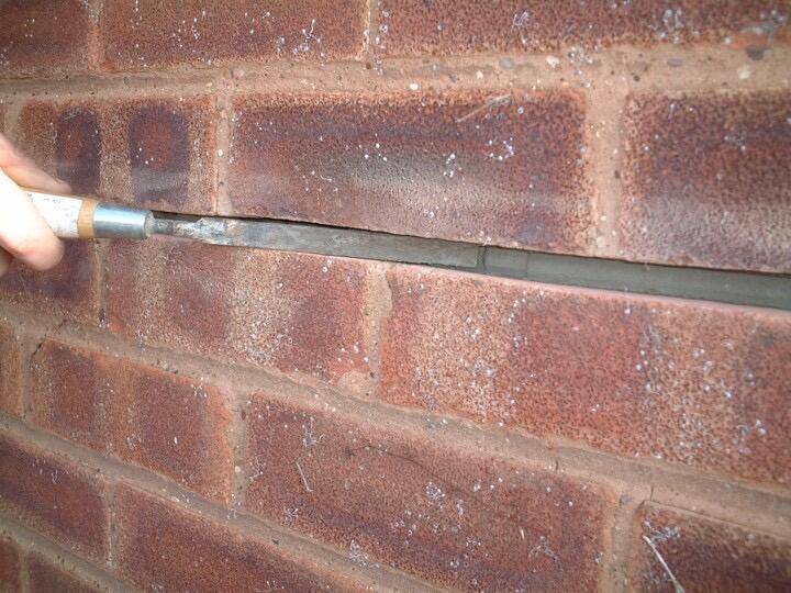 Strucsol HS grout being applied in mortar joint